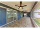 Enjoy this covered screened patio with ceiling fans and views of the backyard at 3330 46Th E Ter, Bradenton, FL 34203