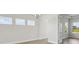 Dining room with neutral paint, hardwood floors, and plenty of natural light at 35617 Stableton Lane, Zephyrhills, FL 33541