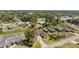 Areal view of the house on a wooded lot with a long driveway and room to park a recreational vehicle at 3610 Woodbridge Ave, North Port, FL 34287