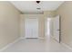 Bedroom featuring tile flooring and closet at 3610 Woodbridge Ave, North Port, FL 34287
