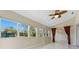 Bright sun room with several windows and vaulted ceiling perfect for relaxing and enjoying the outdoors at 3610 Woodbridge Ave, North Port, FL 34287