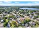 Picturesque neighborhood with tree-lined streets near a serene lake, offering a blend of suburban living and natural beauty at 3708 N 56Th St, Tampa, FL 33619