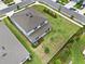 Expansive backyard with manicured lawn and lush landscaping on a well-maintained, two-story home at 3952 Almond Brook Blvd, Land O Lakes, FL 34638