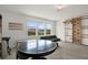 Bright bonus room featuring large windows, a round table and a climbing gym for active play at 3952 Almond Brook Blvd, Land O Lakes, FL 34638