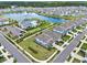 Aerial view of the neighborhood with a pond, pool, and clubhouse at 3952 Almond Brook Blvd, Land O Lakes, FL 34638