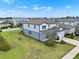 Aerial shot of the side of the two-story house highlighting the large backyard at 3952 Almond Brook Blvd, Land O Lakes, FL 34638