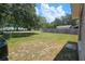 View of the large backyard at 39772 Meadowood Loop, Zephyrhills, FL 33542