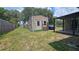 View of the backyard and shed at 39772 Meadowood Loop, Zephyrhills, FL 33542