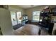 Versatile bonus room with natural light, ideal for an office or hobby space at 39772 Meadowood Loop, Zephyrhills, FL 33542