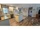 Bright kitchen with a center island and ample cabinet space at 39772 Meadowood Loop, Zephyrhills, FL 33542