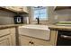 Close-up of kitchen sink with granite countertops at 39772 Meadowood Loop, Zephyrhills, FL 33542