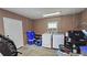 Functional laundry area with washer, dryer, and storage at 39772 Meadowood Loop, Zephyrhills, FL 33542