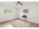 Bright bedroom with two windows allowing for lots of natural light and neutral walls at 4709 W Fair Oaks Ave, Tampa, FL 33611