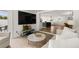 Open living space shows an island, fireplace, access to the outside and an open concept at 4709 W Fair Oaks Ave, Tampa, FL 33611