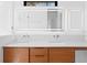 Bright bathroom featuring double sinks, stylish fixtures and modern lighting at 500 38Th Ne Ave, St Petersburg, FL 33704