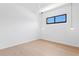 Bright empty room with wood floors and modern pendant lights at 500 38Th Ne Ave, St Petersburg, FL 33704