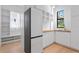 Well-lit pantry with modern appliances, ample shelving, and a dedicated sink area at 500 38Th Ne Ave, St Petersburg, FL 33704