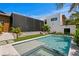 Stunning pool area with a sleek design, complemented by lush landscaping and a modern outdoor living space at 500 38Th Ne Ave, St Petersburg, FL 33704