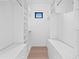 Spacious walk-in closet with custom shelving and ample storage space at 500 38Th Ne Ave, St Petersburg, FL 33704