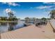 Waterfront property featuring a private dock, boat lift, and space to relax and enjoy picturesque water views at 5208 Denver Ne St, St Petersburg, FL 33703