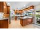 Gourmet kitchen area featuring stainless steel appliances, granite countertops, and plenty of cabinet space at 5208 Denver Ne St, St Petersburg, FL 33703