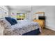 Well-lit bedroom featuring a large window, wood-look flooring, and ample space at 5208 Denver Ne St, St Petersburg, FL 33703