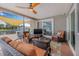 Inviting covered patio with comfortable seating and a tranquil view of the waterfront at 5208 Denver Ne St, St Petersburg, FL 33703