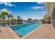Sparkling pool with fountains and lush landscaping overlooking the tranquil canal at 5208 Denver Ne St, St Petersburg, FL 33703