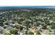 Lovely aerial shot of home in neighborhood close to body of water, mature trees, and lush landscaping at 5413 15Th Ave S, Gulfport, FL 33707