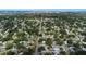 Amazing aerial shot showing the home's location close to main thoroughfare, lush landscaping, and mature trees at 5413 15Th Ave S, Gulfport, FL 33707