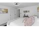 Bright bedroom features a comfortable bed and closet at 5413 15Th Ave S, Gulfport, FL 33707