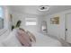 Bright bedroom with modern ceiling fan, lots of natural light, and neutral decor for a calming atmosphere at 5413 15Th Ave S, Gulfport, FL 33707
