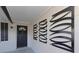 Welcoming front entrance with stylish decor and a modern front door at 5413 15Th Ave S, Gulfport, FL 33707