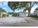 Charming single-story home with a well-maintained front yard and a one-car garage at 5413 15Th Ave S, Gulfport, FL 33707