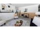 Tastefully designed living room with modern decor and light gray laminate flooring at 5413 15Th Ave S, Gulfport, FL 33707