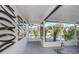 Bright and airy screened patio with views of the surrounding greenery at 5413 15Th Ave S, Gulfport, FL 33707