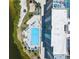Top down aerial view of swimming pool at 5915 Sea Ranch Dr # 202, Hudson, FL 34667