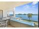 Relaxing balcony view overlooking serene waters and lush landscaping, perfect for enjoying outdoor living at 5915 Sea Ranch Dr # 202, Hudson, FL 34667