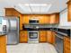 Well-equipped kitchen featuring stainless steel appliances, granite countertops, and ample cabinet space at 5915 Sea Ranch Dr # 202, Hudson, FL 34667