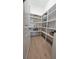 Walk-in pantry with ample shelving for organized storage and easy access at 620 Marmora Ave, Tampa, FL 33606