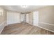 Neutral bedroom with multiple closets and a sliding barn door at 6241 Ansley St, Spring Hill, FL 34606