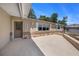 Home exterior showcasing the driveway, front door, decorative shutters, and stone accents along the base at 6241 Ansley St, Spring Hill, FL 34606