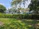 Backyard featuring a RV camper with a manicured hedge providing privacy at 6317 Buster Dr, Tampa, FL 33619