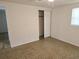 Bedroom with a closet, window and ceiling fan at 6317 Buster Dr, Tampa, FL 33619