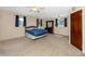 Bedroom featuring plush carpeting, ample natural light, and classic furnishings at 6536 115Th Ln, Seminole, FL 33772
