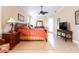 Comfortable main bedroom features a ceiling fan, natural light, and neutral paint at 6933 Cozumel Ct, Land O Lakes, FL 34637