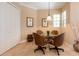 Cozy dining area with a round table and four chairs, perfect for intimate meals at 6933 Cozumel Ct, Land O Lakes, FL 34637