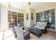 Relaxing screened in patio with lots of room for lounging at 6933 Cozumel Ct, Land O Lakes, FL 34637