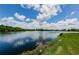 Picturesque waterfront view showcasing calm waters and lush greenery at 699 Merlins Ct, Tarpon Springs, FL 34689
