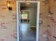 A view from the front door to the interior featuring tile floors and trim at 7014 Doreen St, Tampa, FL 33617